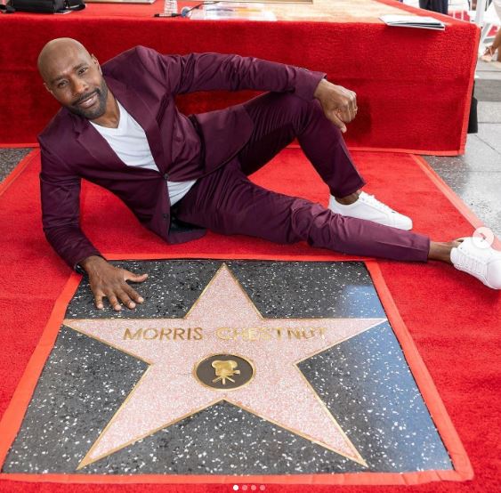 Pam Byse's Husband Morris Chestnut  posing at his Hollywood Walk of Fame